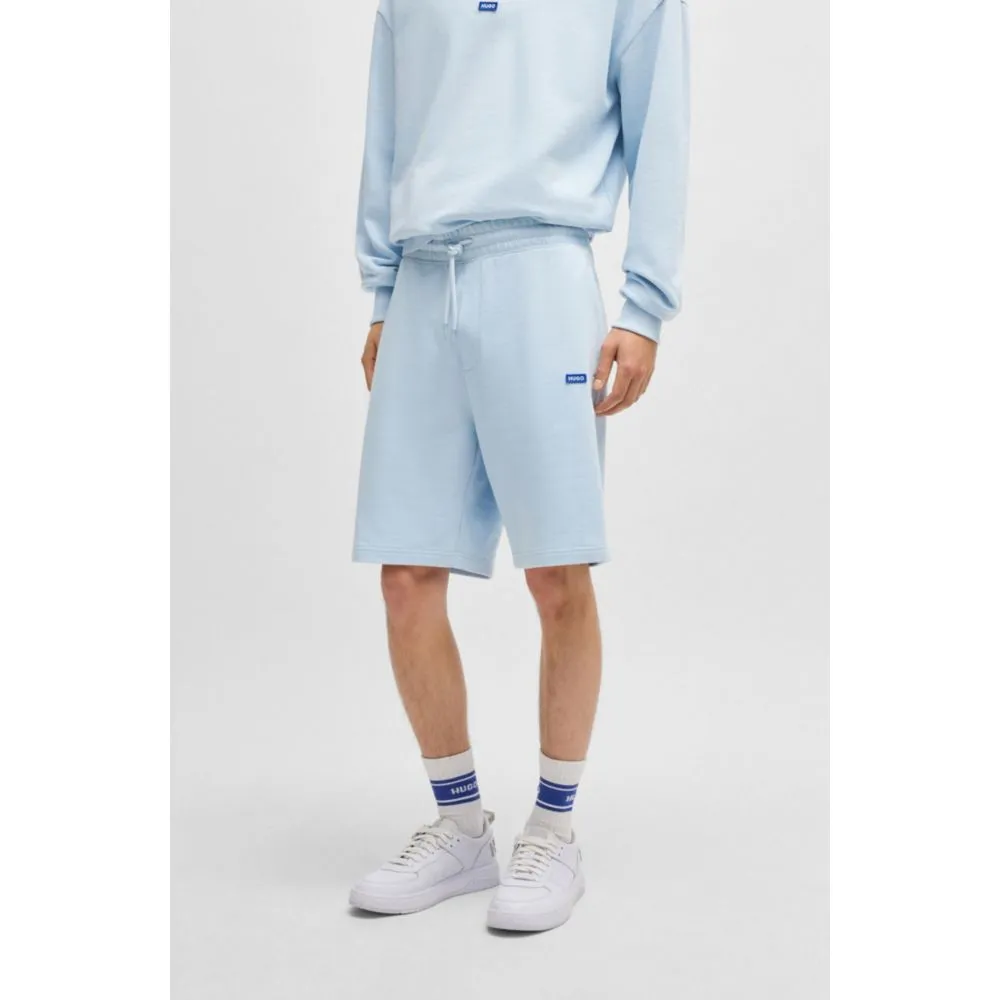 Cotton-terry shorts with blue logo patch