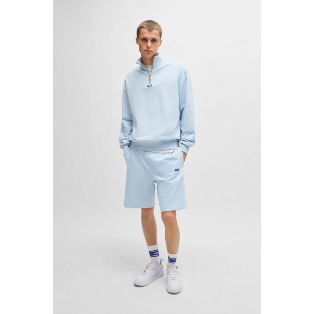 Cotton-terry shorts with blue logo patch