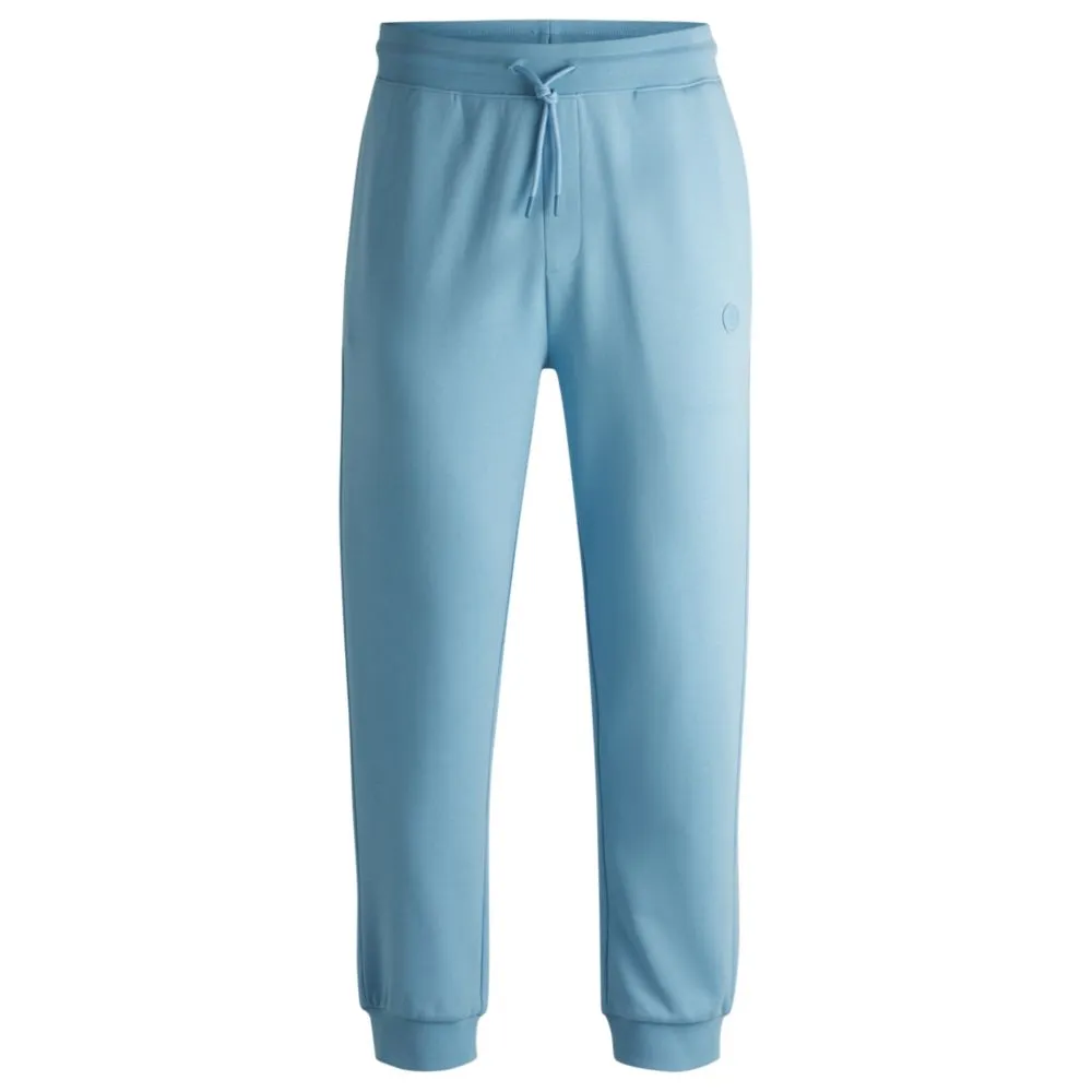 Cotton-terry tracksuit bottoms with Happy HUGO logo patch