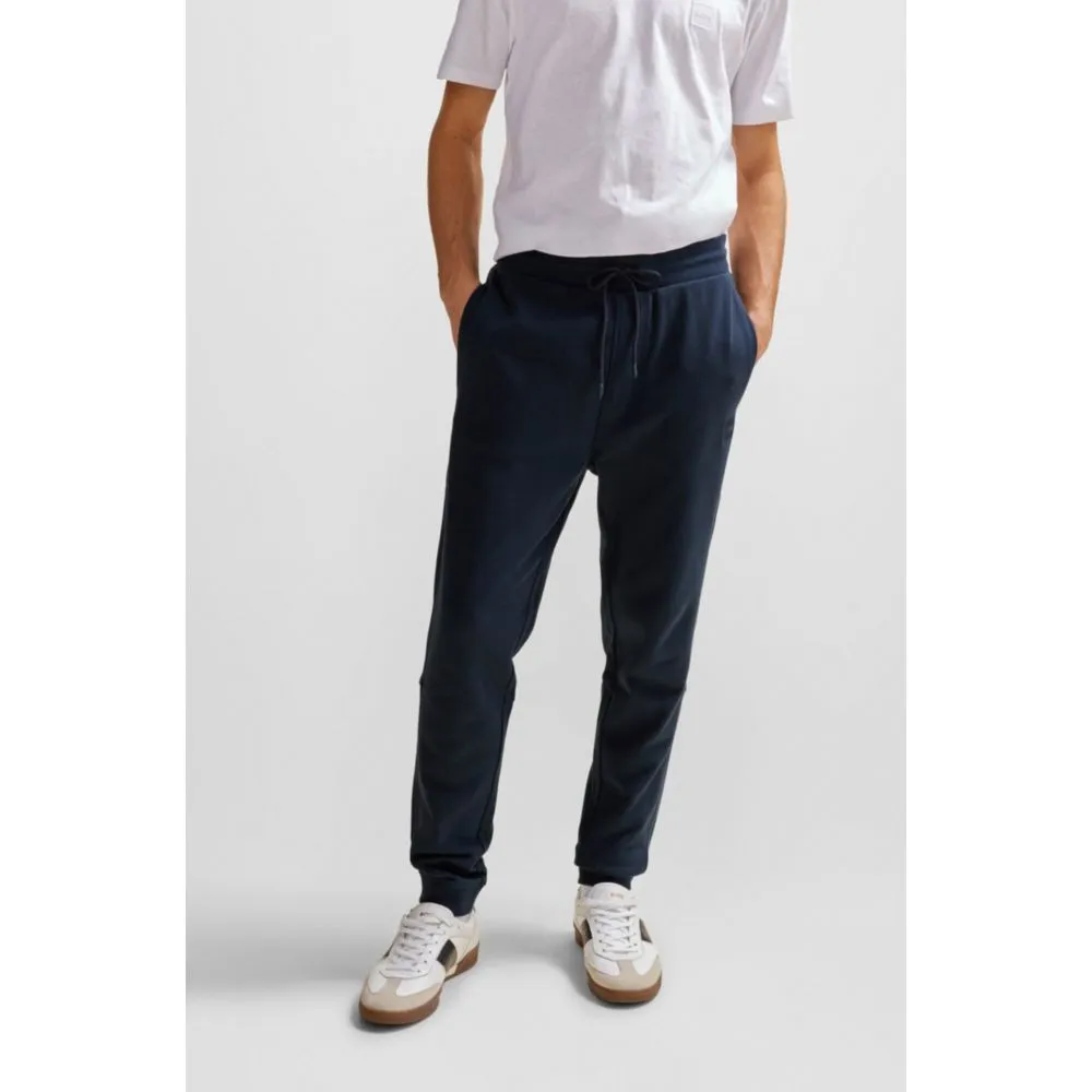 Cotton-terry tracksuit bottoms with logo patch