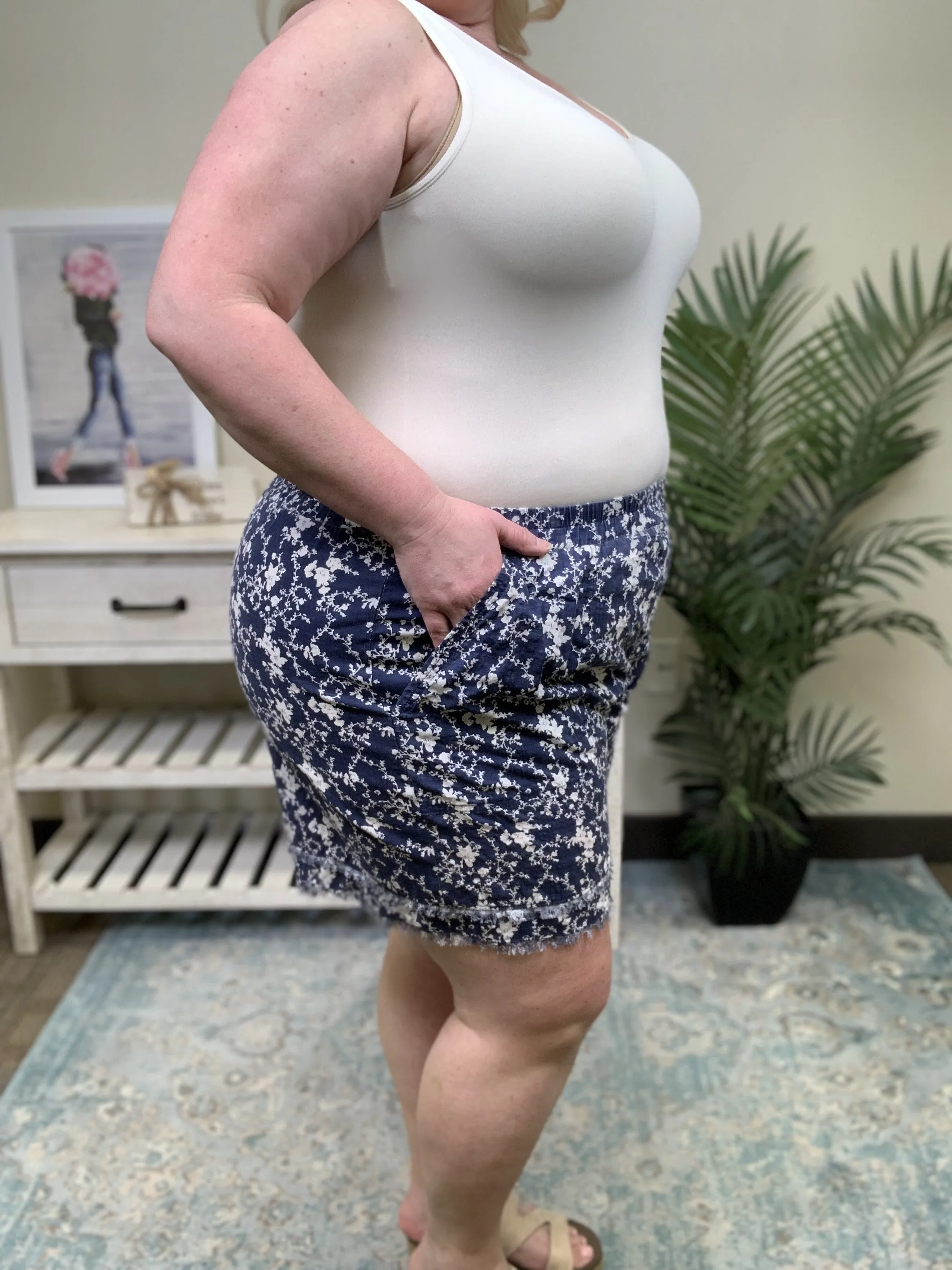 Keep Me Guessing Women's Floral Frayed Hem Shorts