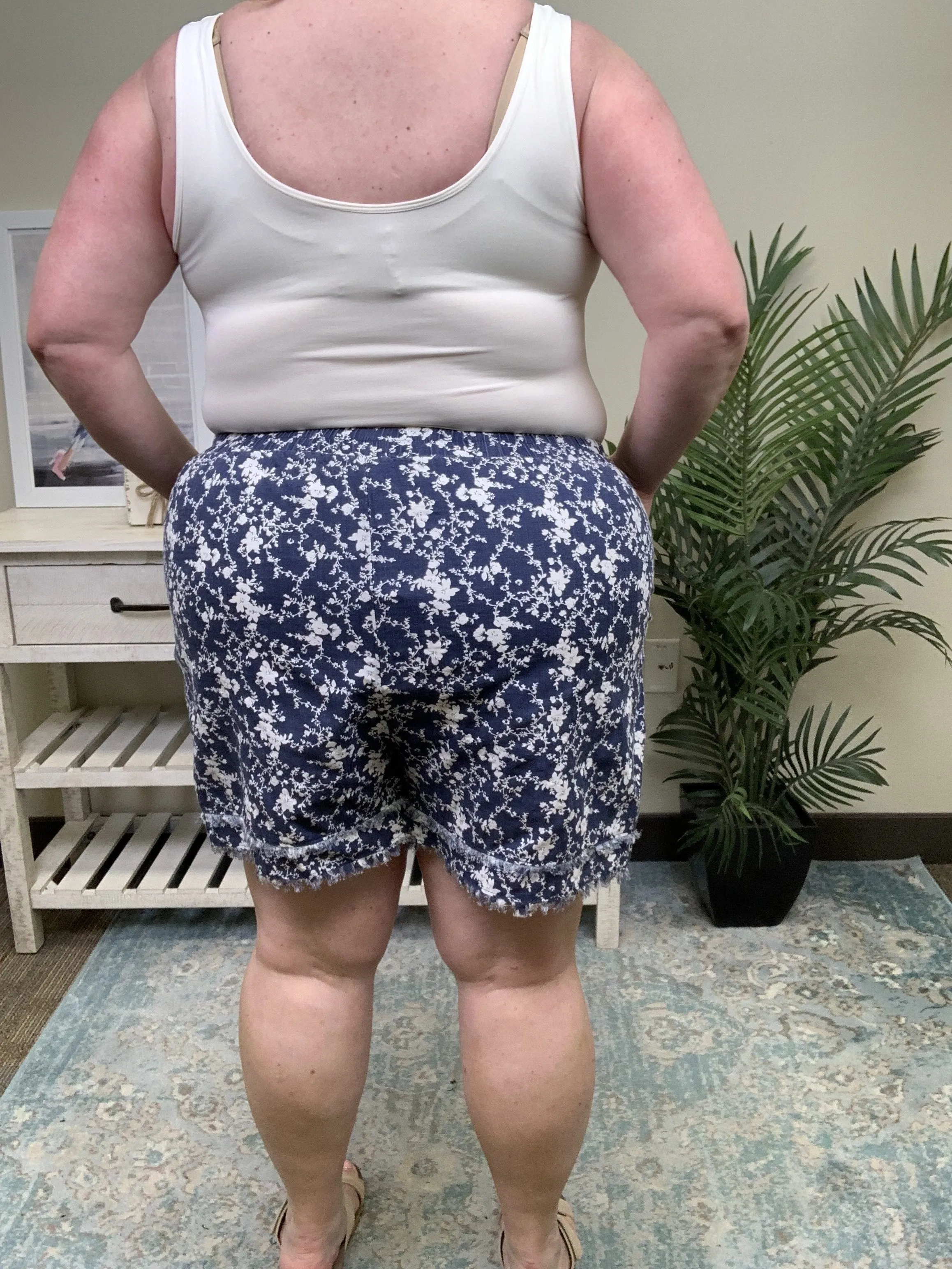 Keep Me Guessing Women's Floral Frayed Hem Shorts