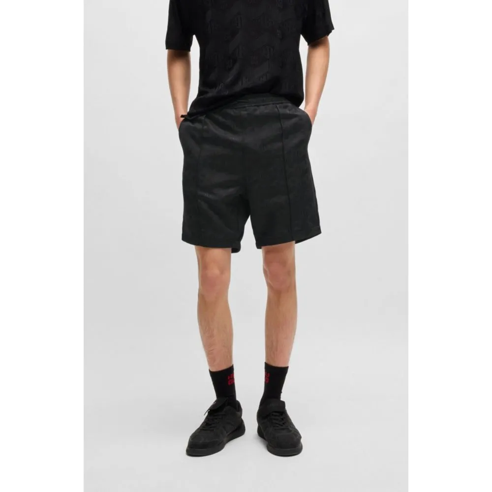 Relaxed-fit shorts with geometric logos