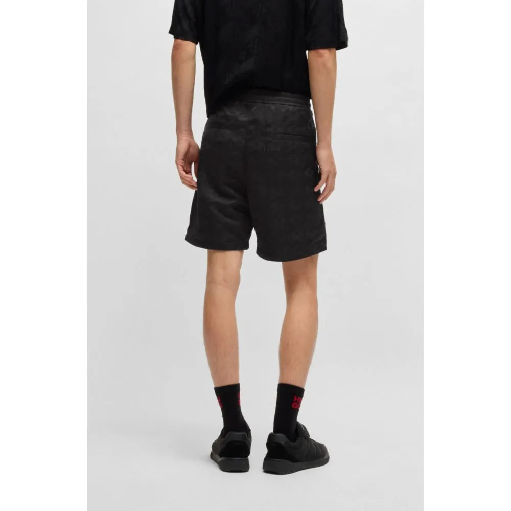 Relaxed-fit shorts with geometric logos