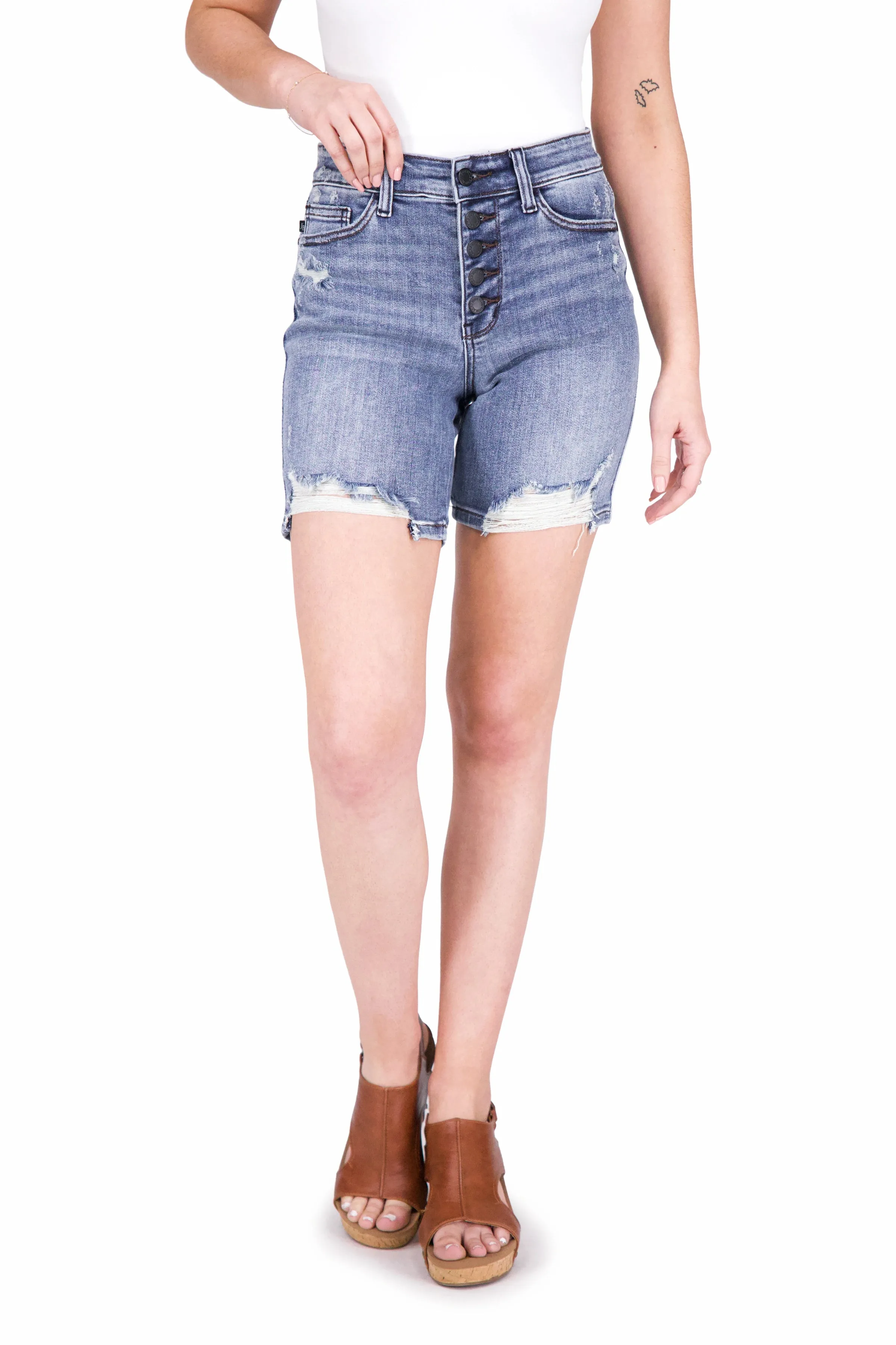 The Luna from Judy Blue: Mid-Rise Button Fly Destroyed Hem Denim Shorts