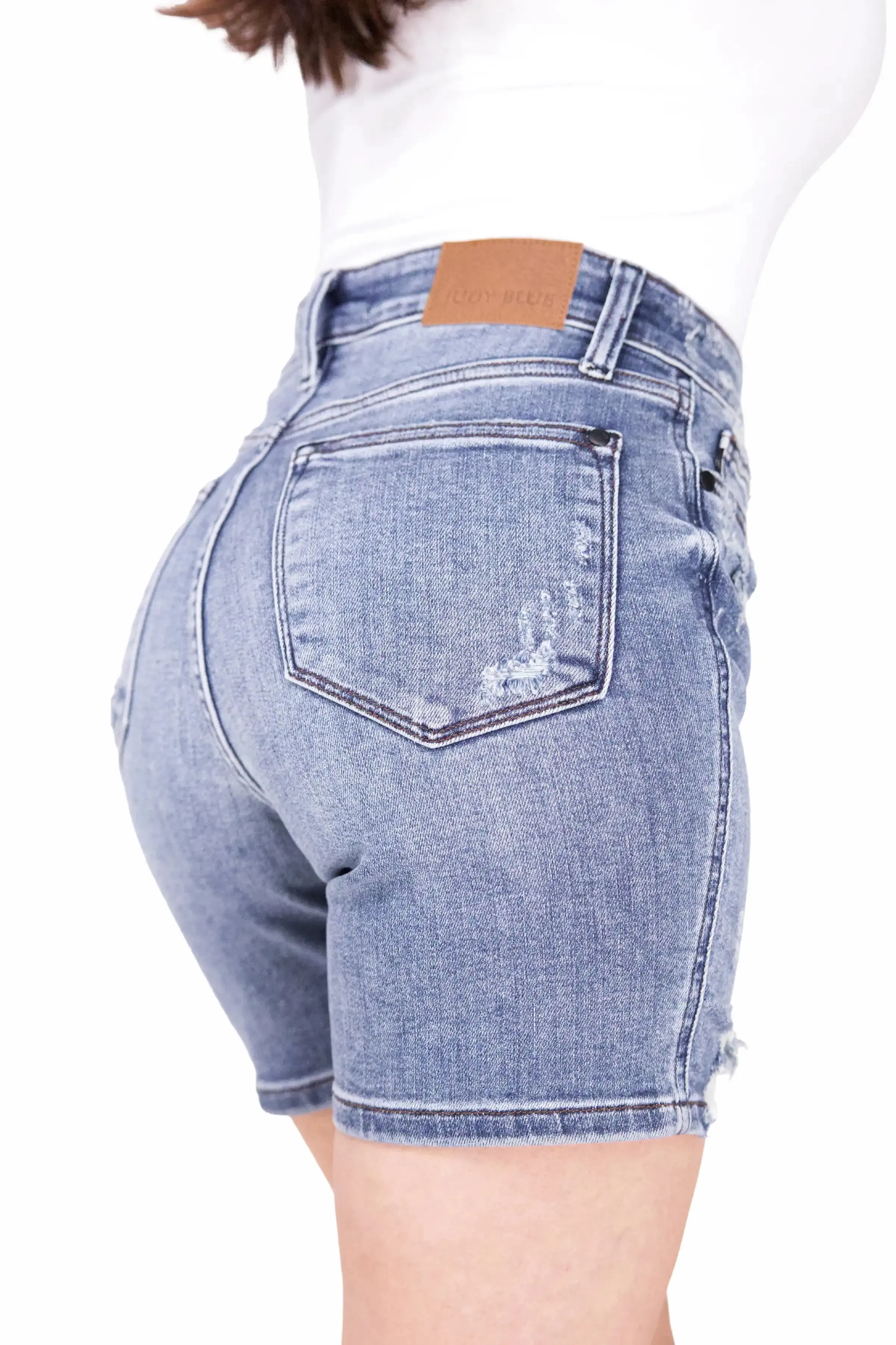 The Luna from Judy Blue: Mid-Rise Button Fly Destroyed Hem Denim Shorts