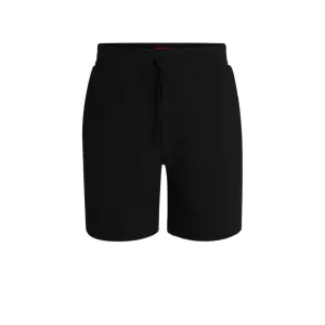 Waffle-structured pajama shorts with embroidered logo